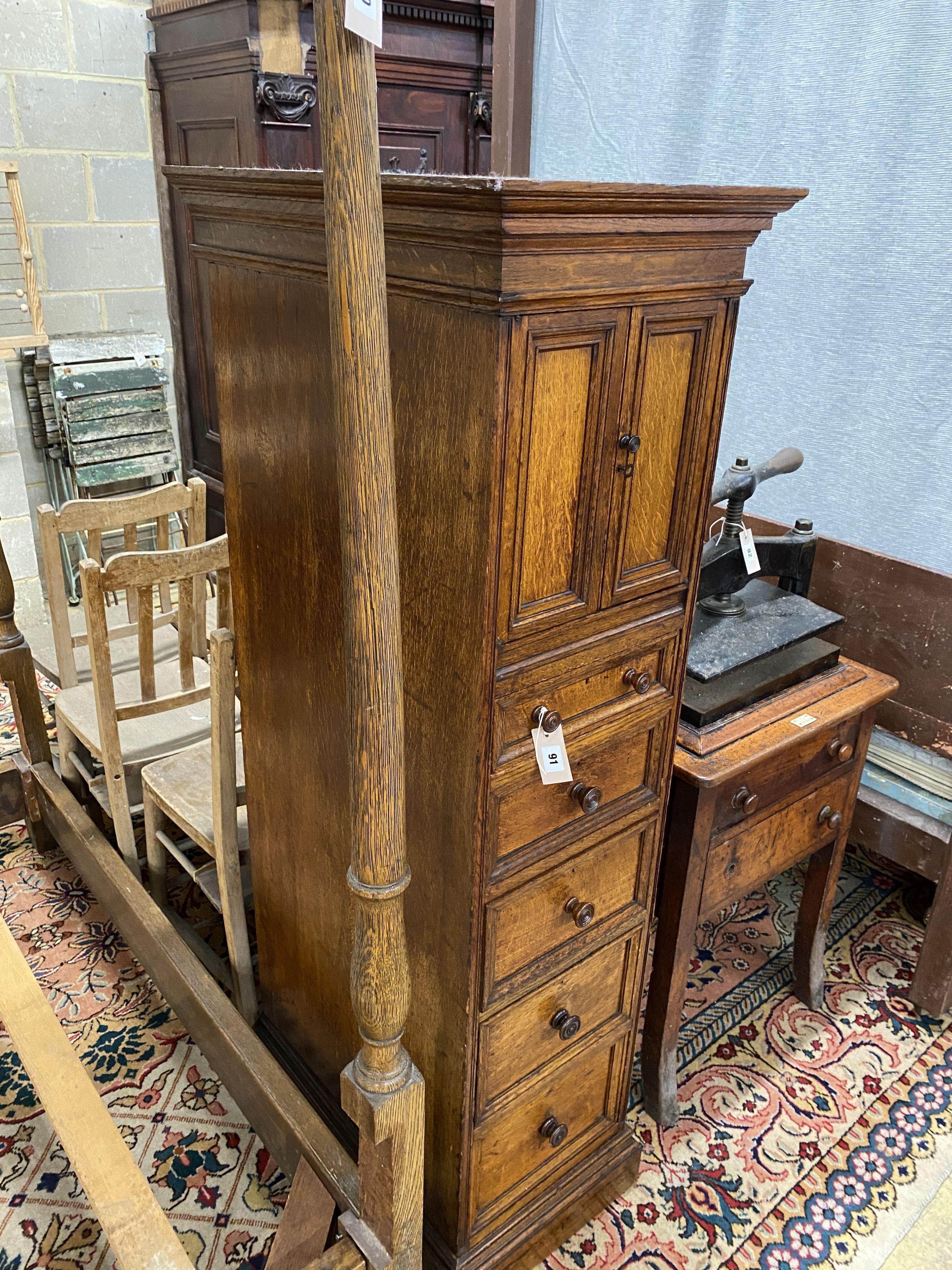 An unusual Victorian oak five drawer cabinet, width 43cm, depth 65cm, height 155cm